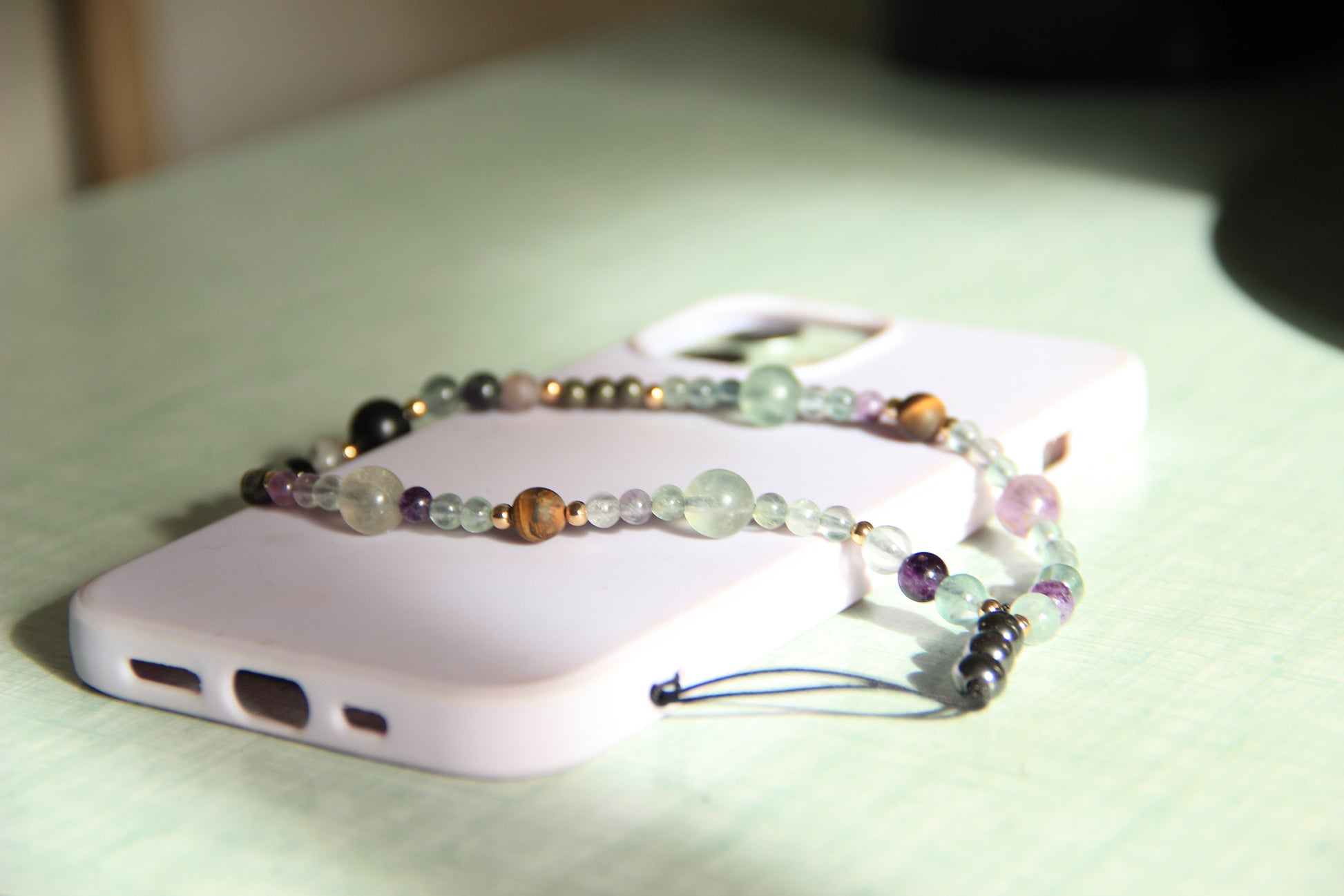 bijou de téléphone en pierres semi précieuses