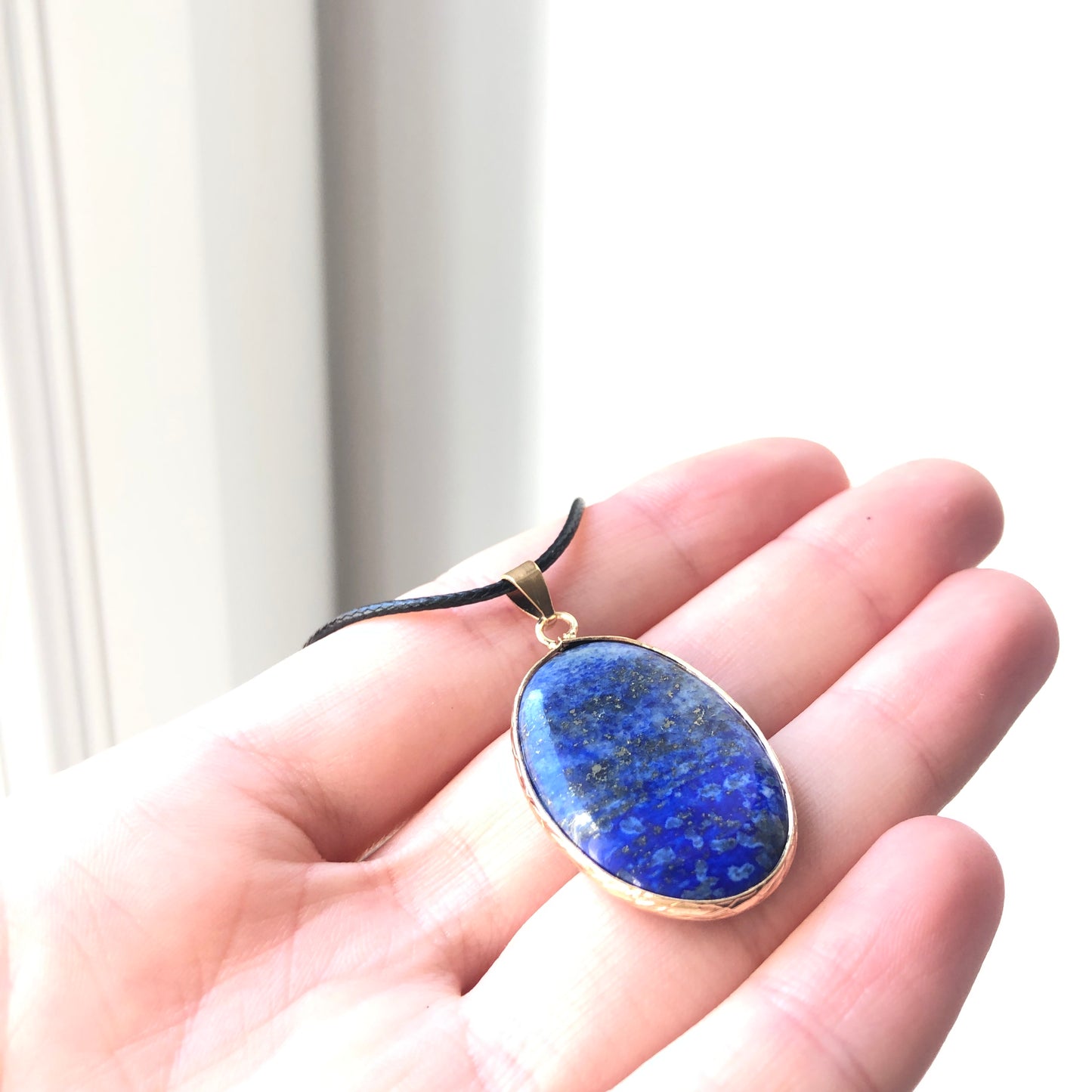 Pendentif Lapis Lazuli - ovale • doré